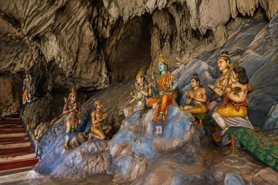 Colourful figures inside Ramayana Cave